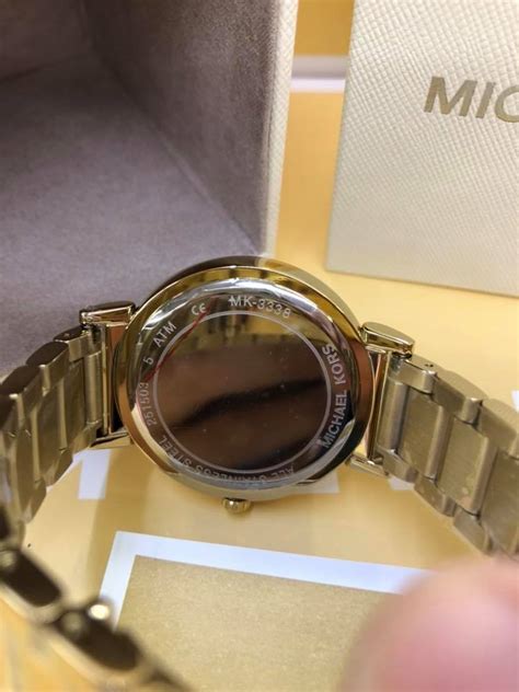 michael kors watch serial number verification|michael kors style number lookup.